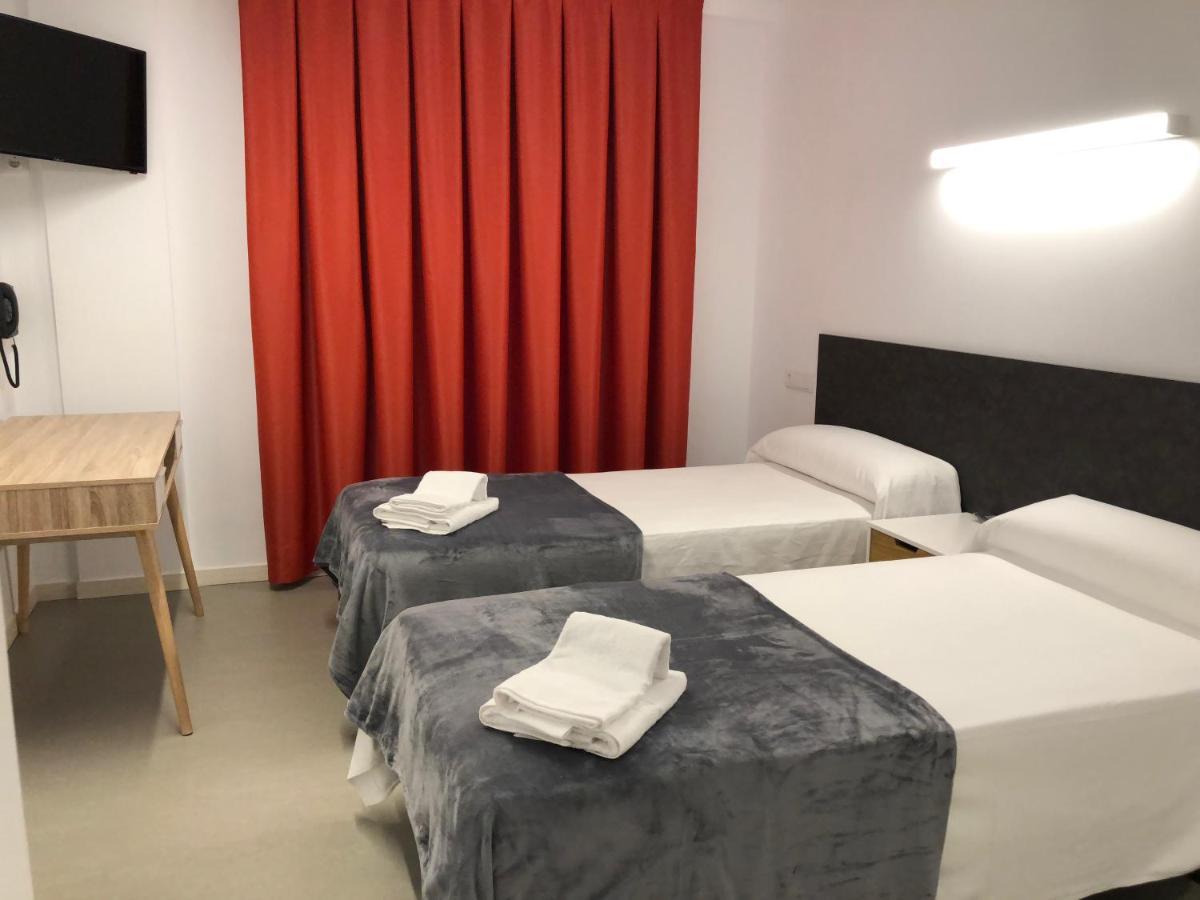 Epsilon Alcaniz Hotel Bagian luar foto