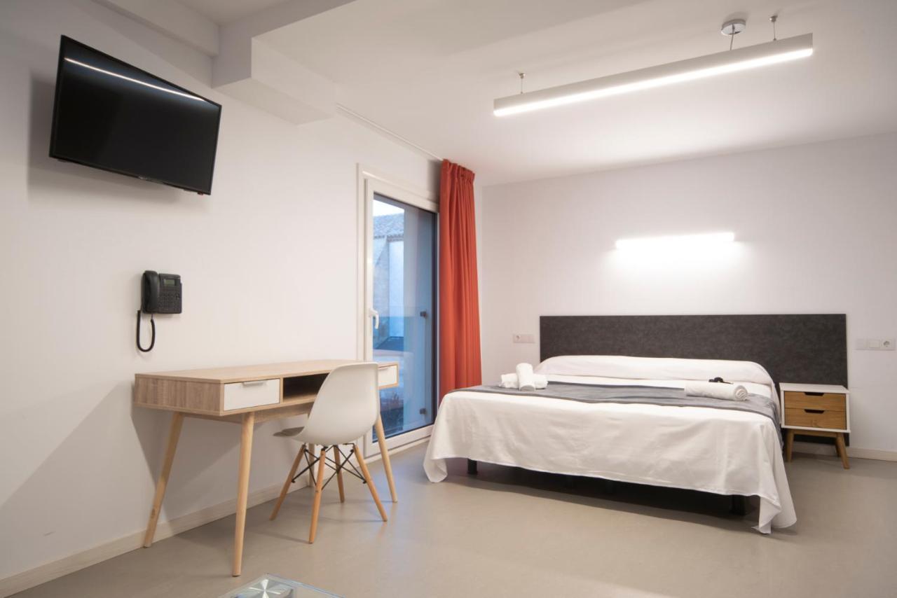 Epsilon Alcaniz Hotel Bagian luar foto