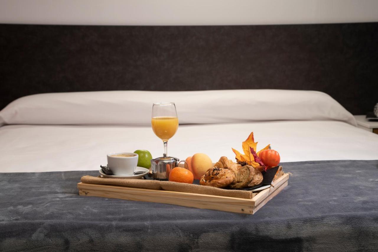 Epsilon Alcaniz Hotel Bagian luar foto